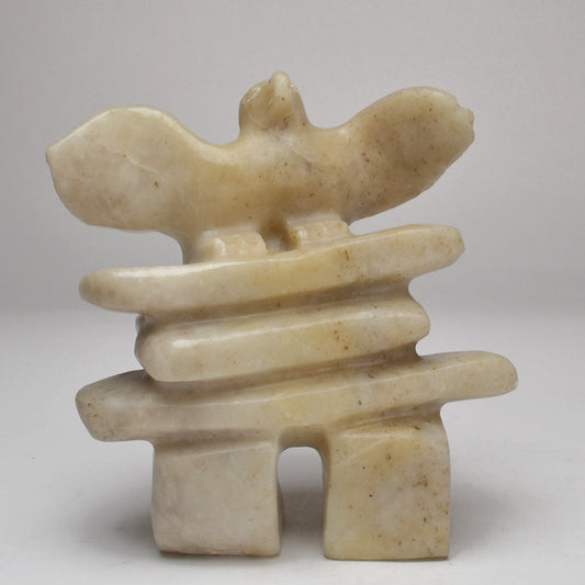 Bird on an Inukshuk